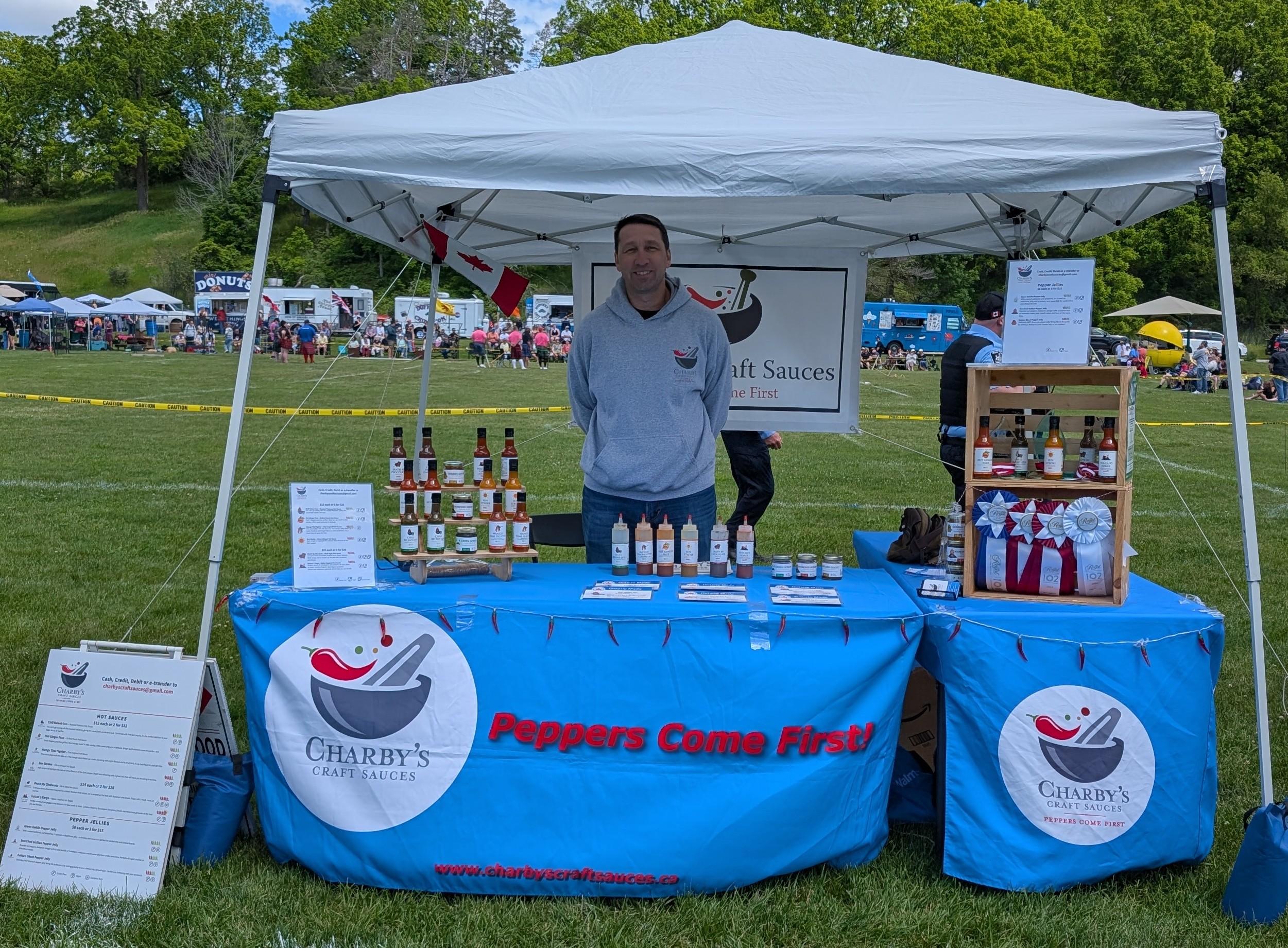 Paul at a Charby's Craft Sauces market booth